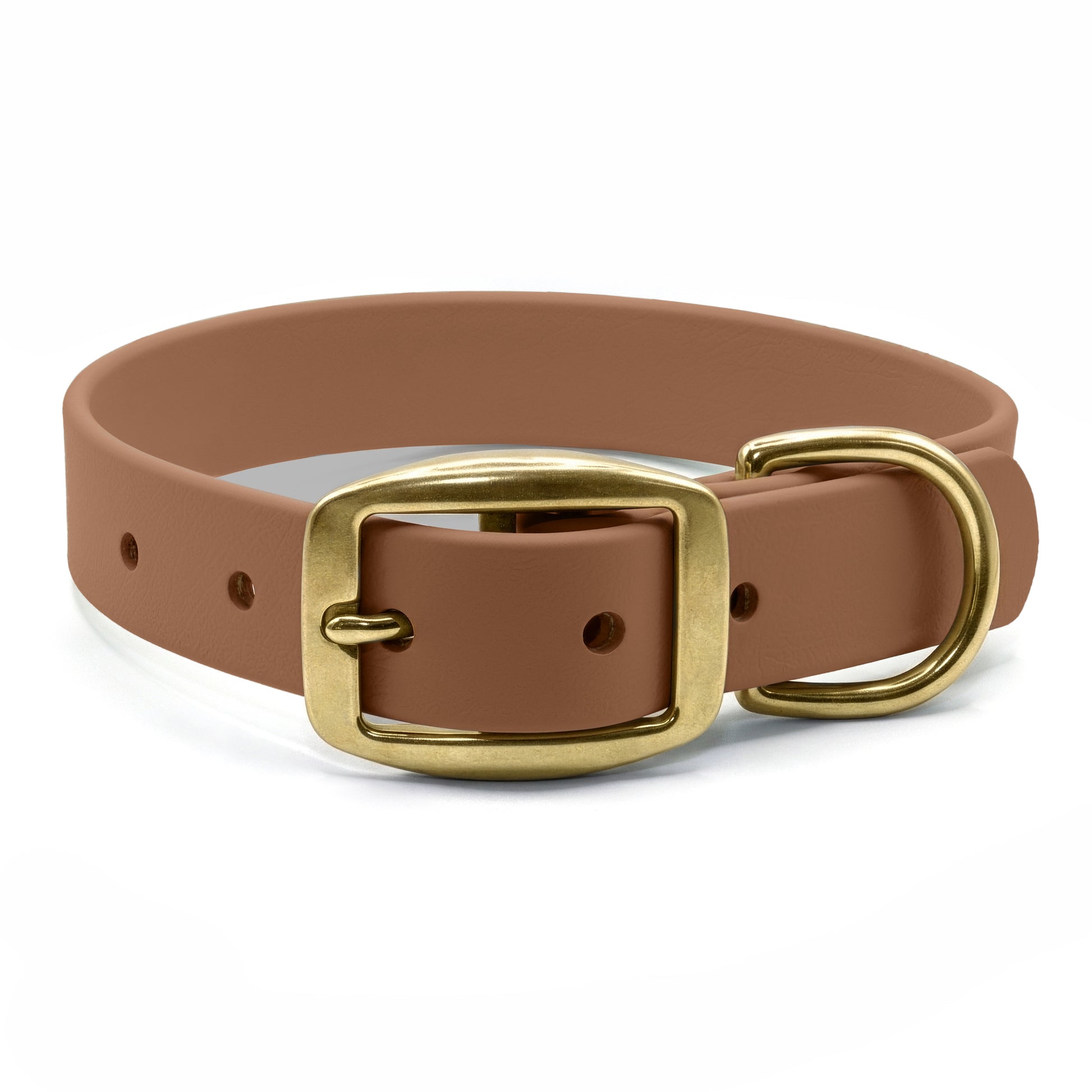 Tan biothane dog collar with brass hardware on a white background